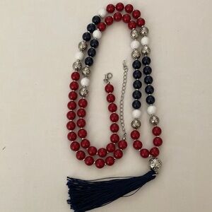 Pretty vintage red, white and blue beaded necklace with tassel